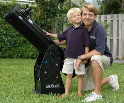 Michael W. and 5 yr. old son Jace with an Orion Dob!